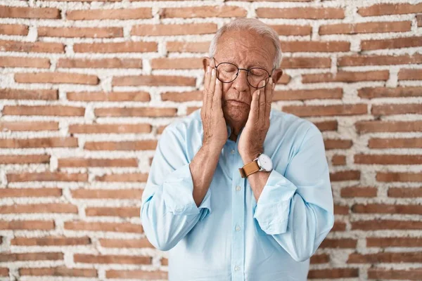 Senior Man Grey Hair Standing Bricks Wall Tired Hands Covering — Photo