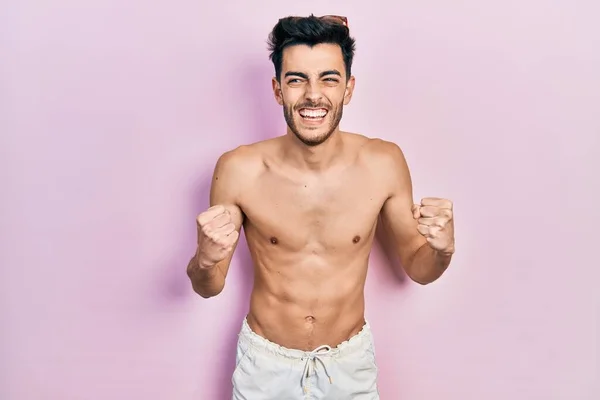 Young Hispanic Man Wearing Swimwear Shirtless Very Happy Excited Doing — Stock Photo, Image