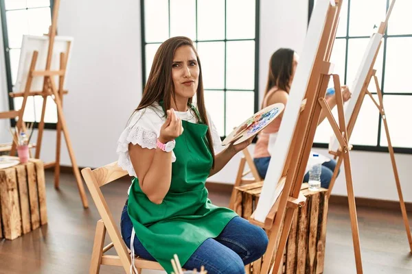 Young Hispanic Artist Women Painting Canvas Art Studio Doing Money — Stock Photo, Image