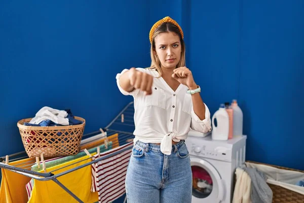 Young Blonde Woman Laundry Room Punching Fist Fight Aggressive Angry — Stockfoto