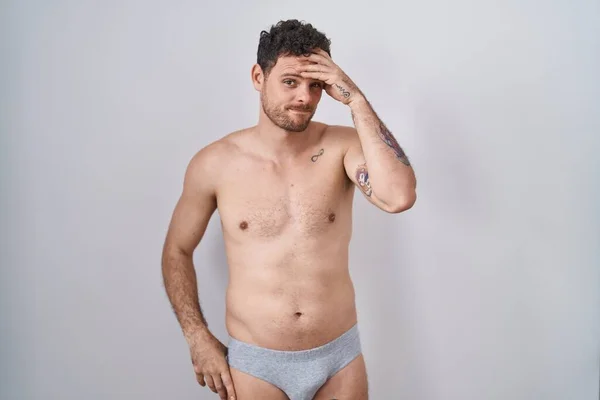Young Hispanic Man Standing Shirtless Wearing Underware Worried Stressed Problem — Stock Photo, Image