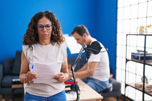 Middle Age Hispanic Woman Singing Music Studio Skeptic Nervous Frowning — Photo