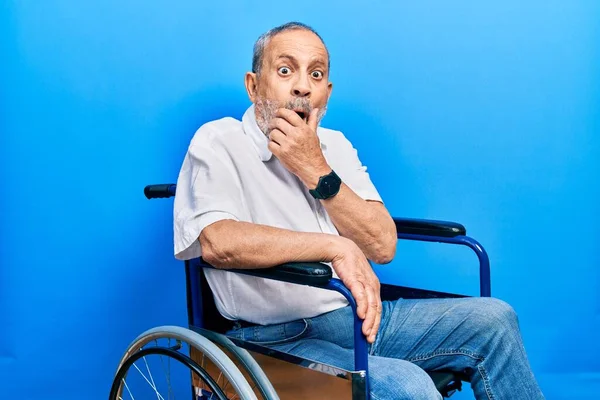 Handsome Senior Man Beard Sitting Wheelchair Shocked Covering Mouth Hands — Foto Stock