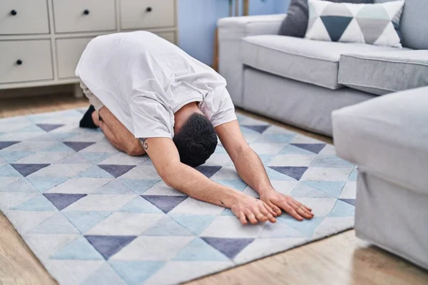 Young Arab Man Stretching Home — Stock Photo, Image