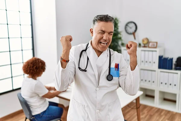 Middle Age Doctor Man Clinic Patient Very Happy Excited Doing — Fotografia de Stock