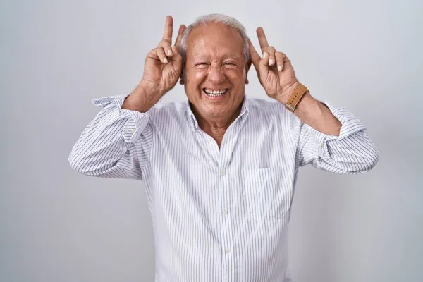 Senior Man Grey Hair Standing Isolated Background Posing Funny Crazy — Stockfoto