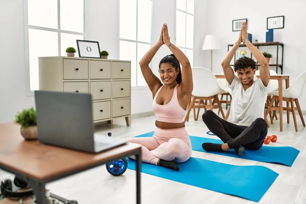 Young Latin Sporty Couple Smiling Happy Having Online Yoga Class — Stock Photo, Image