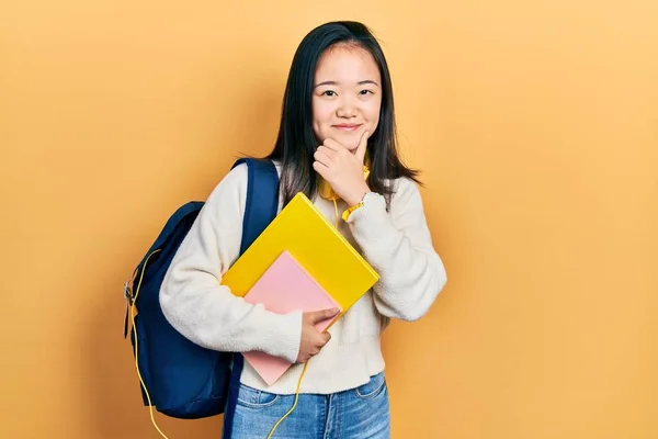 Young Chinese Girl Holding Student Backpack Books Looking Confident Camera — Fotografia de Stock