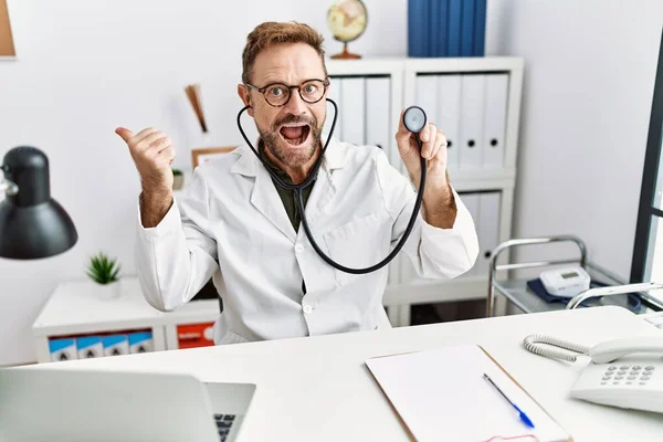Middle Age Man Beard Wearing Doctor Uniform Holding Stethoscope Pointing — 图库照片