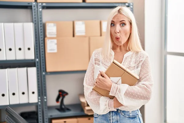 Caucasian Woman Working Small Business Ecommerce Shock Face Looking Skeptical — Stok fotoğraf