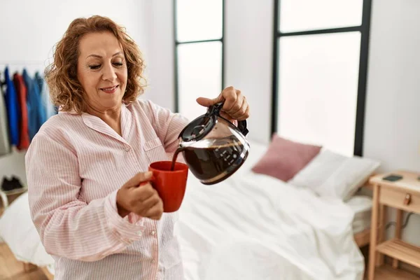 Middle Age Caucasian Woman Drinking Coffee Standing Bedroom — Stock Photo, Image