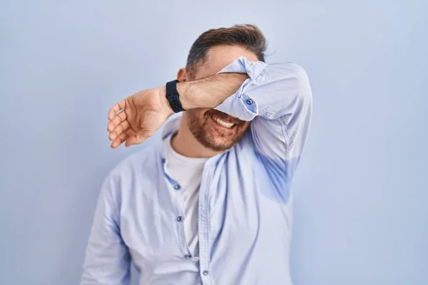 Middle Age Caucasian Man Standing Blue Background Covering Eyes Arm — Foto Stock