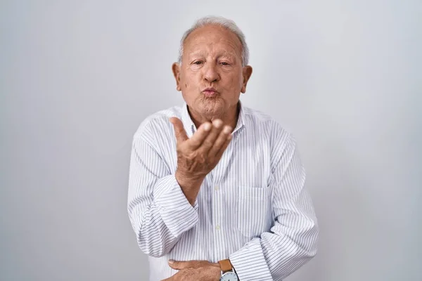 Senior Man Grey Hair Standing Isolated Background Looking Camera Blowing — Photo