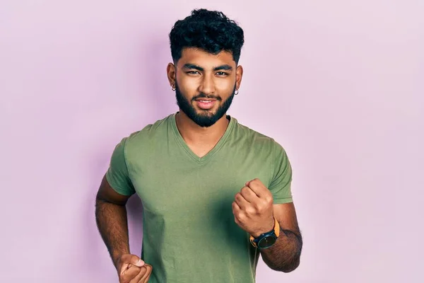 Arab Man Beard Wearing Casual Green Shirt Celebrating Surprised Amazed — Stock Fotó