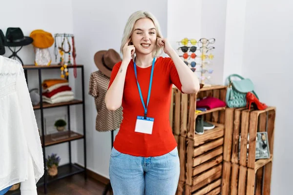 Young Caucasian Woman Working Manager Retail Boutique Covering Ears Fingers — Stockfoto