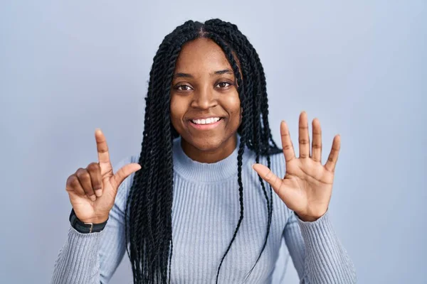 African American Woman Standing Blue Background Showing Pointing Fingers Number — Stockfoto