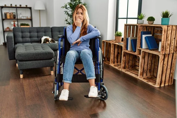 Young Beautiful Woman Sitting Wheelchair Home Looking Stressed Nervous Hands — 스톡 사진