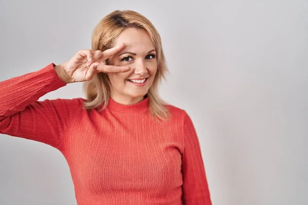 Blonde Woman Standing Isolated Background Doing Peace Symbol Fingers Face — Foto de Stock