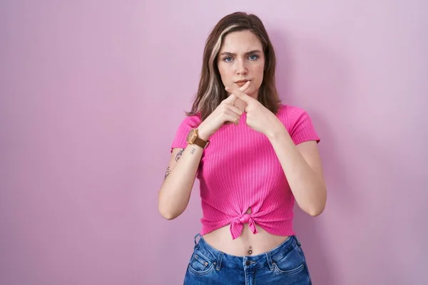 Blonde Caucasian Woman Standing Pink Background Rejection Expression Crossing Fingers — Photo
