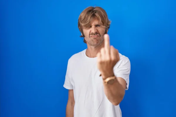 Middle Age Man Standing Blue Background Showing Middle Finger Impolite — Stockfoto