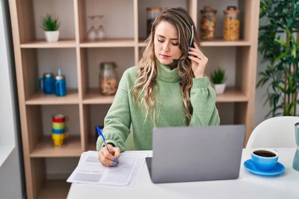 Young Woman Call Center Agent Writing Document Home — Stockfoto