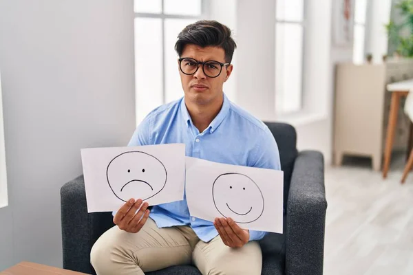 Hispanic Man Working Depression Holding Sad Happy Emotion Paper Skeptic — Stock Photo, Image