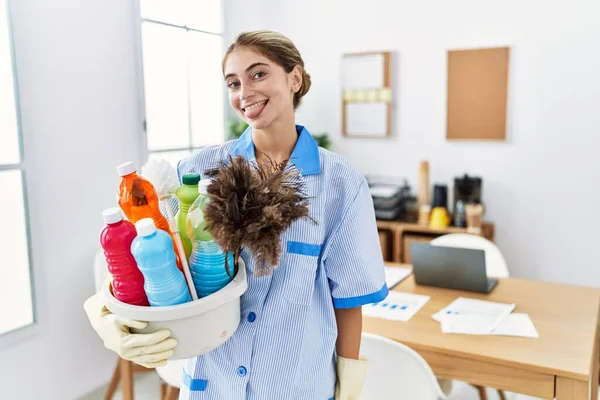 Young Blonde Woman Wearing Cleaner Uniform Holding Cleaning Products Sticking — Stock Photo, Image