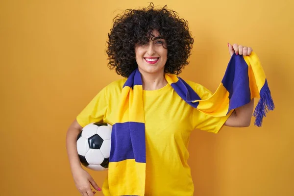 Young Brunette Woman Curly Hair Football Hooligan Holding Ball Smiling — ストック写真