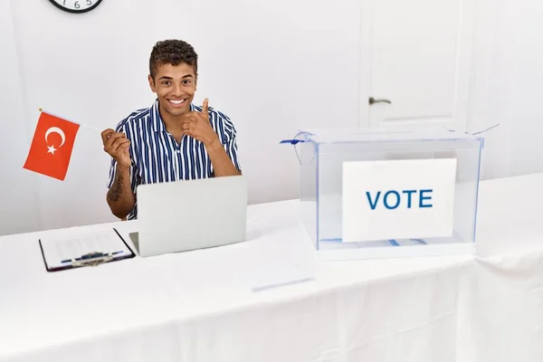 Young Handsome Hispanic Man Political Campaign Election Holding Tunisia Flag — Stock Photo, Image