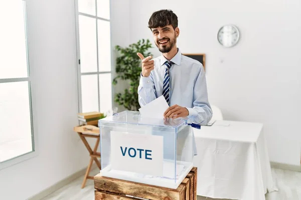 Hispanic Man Beard Voting Putting Envelop Ballot Box Pointing Fingers —  Fotos de Stock