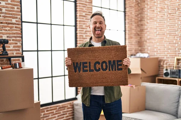 Middle Age Caucasian Man Holding Welcome Doormat New Home Sticking — Fotografia de Stock