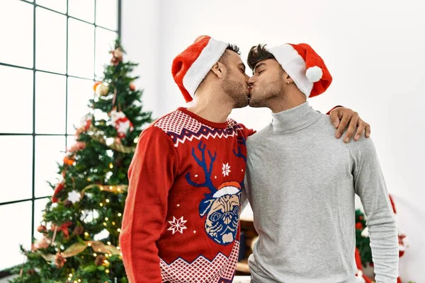 Two Hispanic Men Couple Kissing Hugging Each Other Standing Christmas — Stock Photo, Image