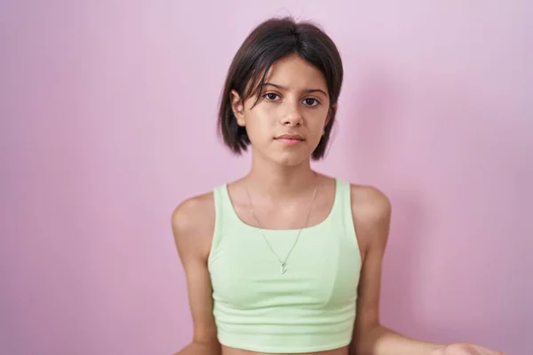 Young Girl Standing Pink Background Clueless Confused Open Arms Idea — Stock Photo, Image