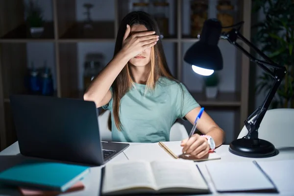 Teenager Girl Doing Homework Home Late Night Covering Eyes Hand — Stock fotografie