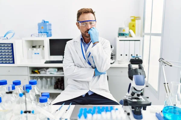 Middle Age Man Working Scientist Laboratory Looking Stressed Nervous Hands — Zdjęcie stockowe