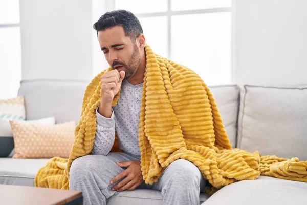 Young Hispanic Man Sitting Sofa Coughing Home — Stock Photo, Image