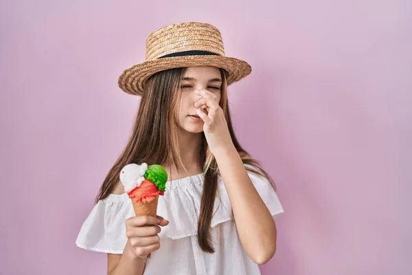 Teenager Girl Holding Ice Cream Smelling Something Stinky Disgusting Intolerable — Zdjęcie stockowe