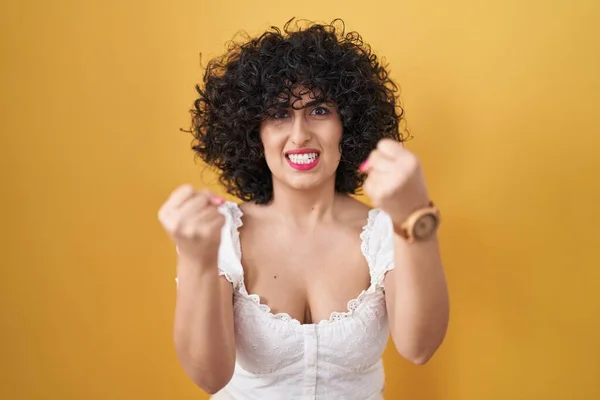 Young Brunette Woman Curly Hair Standing Yellow Background Angry Mad — Photo