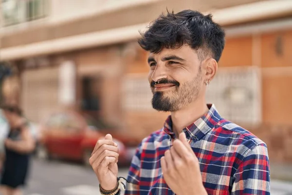 Young Hispanic Man Smiling Confident Doing Spend Money Gesture Street — Stock Fotó