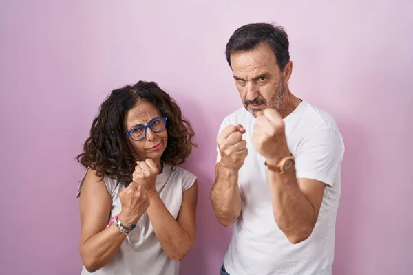Middle Age Hispanic Couple Together Pink Background Ready Fight Fist — Stok fotoğraf