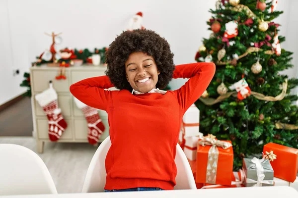 Young African American Woman Relaxed Hands Head Sitting Christmas Tree — Fotografia de Stock