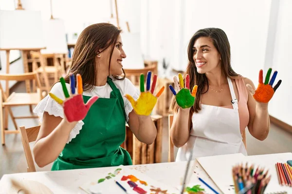 Two Latin Students Smiling Happy Showing Fun Painted Hands Art — Stock Photo, Image