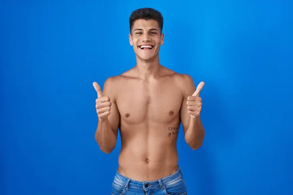 Young Hispanic Man Standing Shirtless Blue Background Success Sign Doing —  Fotos de Stock