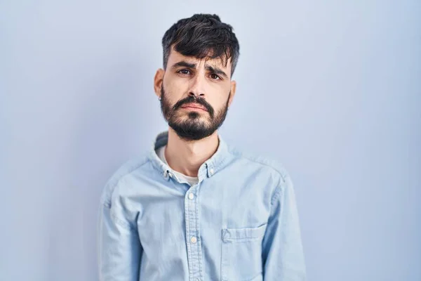 Young Hispanic Man Beard Standing Blue Background Depressed Worry Distress — ストック写真