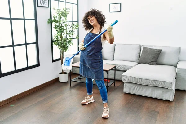 Young Middle East Woman Cleaning Using Mop Guitar Home — Stockfoto