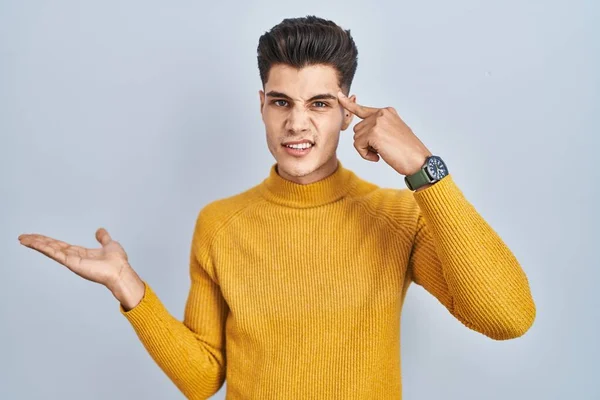 Young Hispanic Man Standing Blue Background Confused Annoyed Open Palm — Foto de Stock