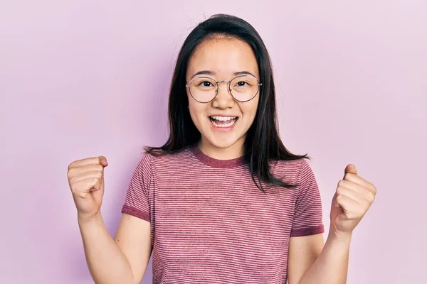 Young Chinese Girl Wearing Casual Clothes Glasses Celebrating Surprised Amazed — 스톡 사진