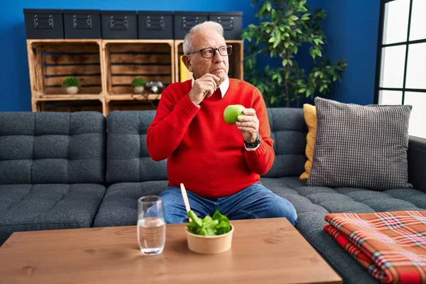 Senior Man Grey Hair Eating Salad Green Apple Serious Face — Stock fotografie