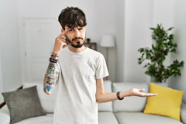 Hispanic Man Beard Living Room Home Confused Annoyed Open Palm — Stock Fotó