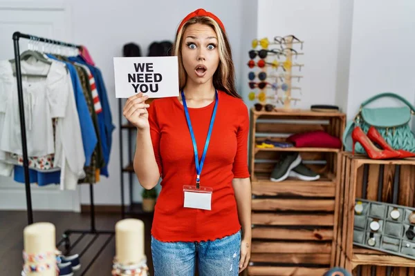 Young Caucasian Woman Holding Need You Banner Hiring Retail Shop — Foto de Stock